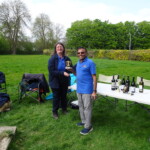 Ash receives the 2021 Singles League winner's memento.